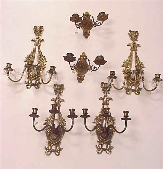 Appraisal: Four ornate brass three light sconces with pheasant heads and