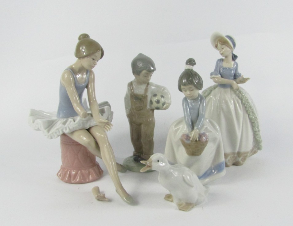 Appraisal: Five Lladro Nao figures comprising of a seated ballerina girl