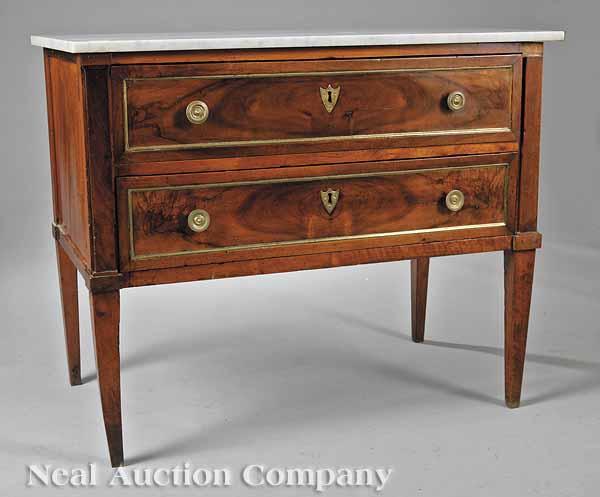 Appraisal: An Empire Fruitwood Commode early th c the rectangular white