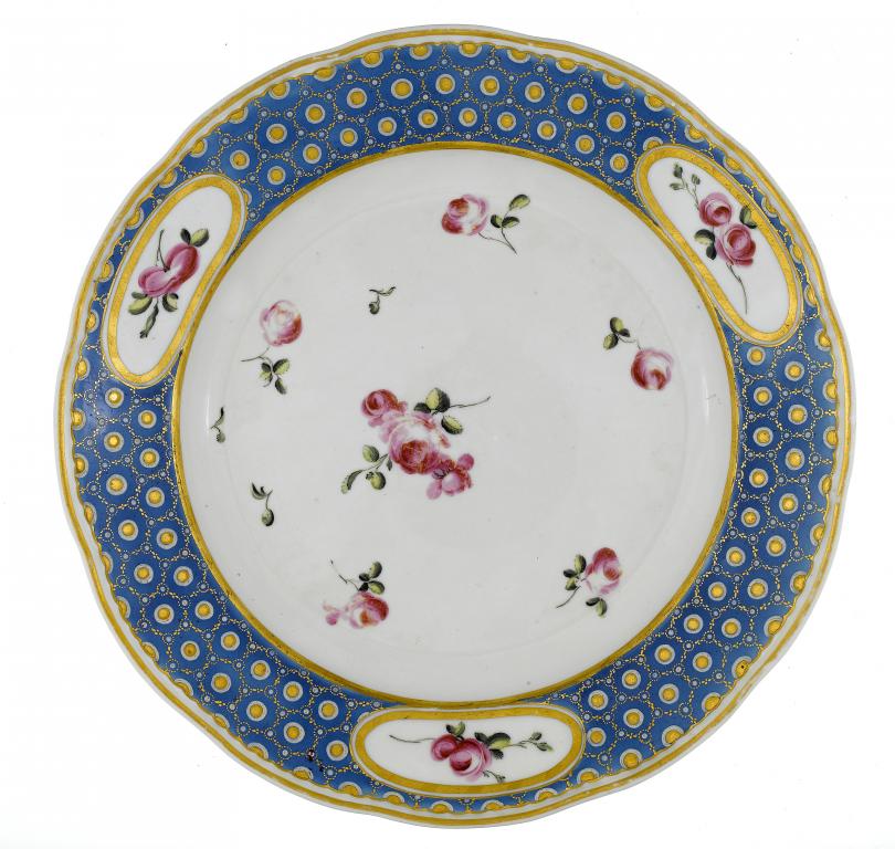 Appraisal: A CHELSEA-DERBY PLATE OF NORTHUMBERLAND PATTERN enamelled with scattered roses