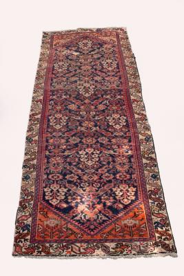 Appraisal: A Hamadan runner West Persia circa lacking guard stripes cm