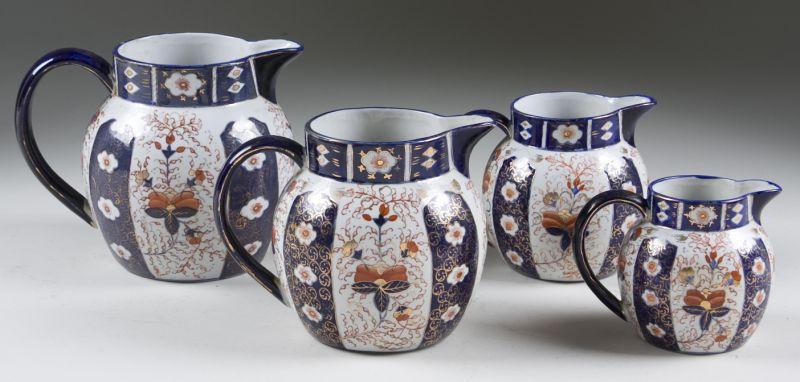 Appraisal: Set of Four Graduated Staffordshire Pitchers th c all with