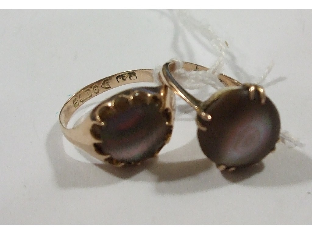 Appraisal: Two Edwardian ct rose gold abalone single stone rings