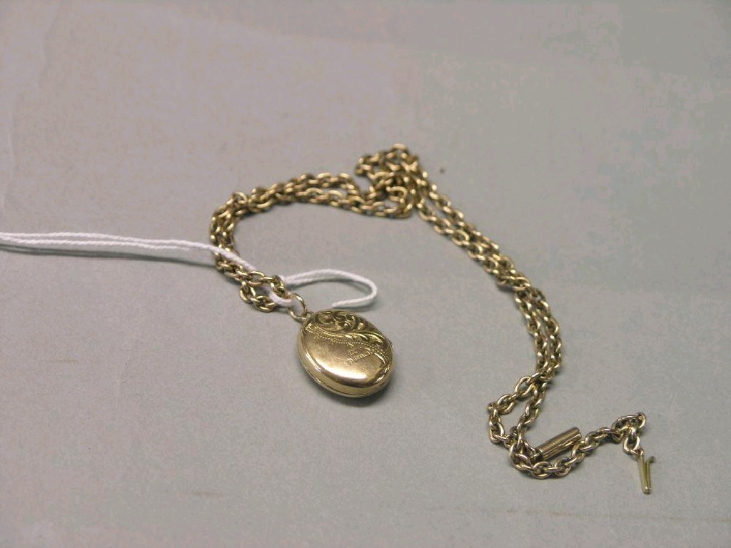 Appraisal: A ct gold necklace grams and an engraved gold locket