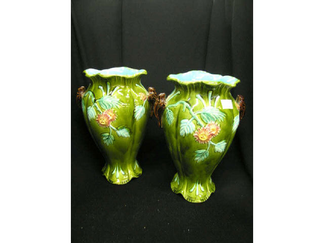 Appraisal: Pair of Majolica Pottery Vases raised floral design