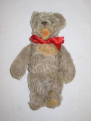 Appraisal: A Steiff Zotty bear covered in two colour plush button