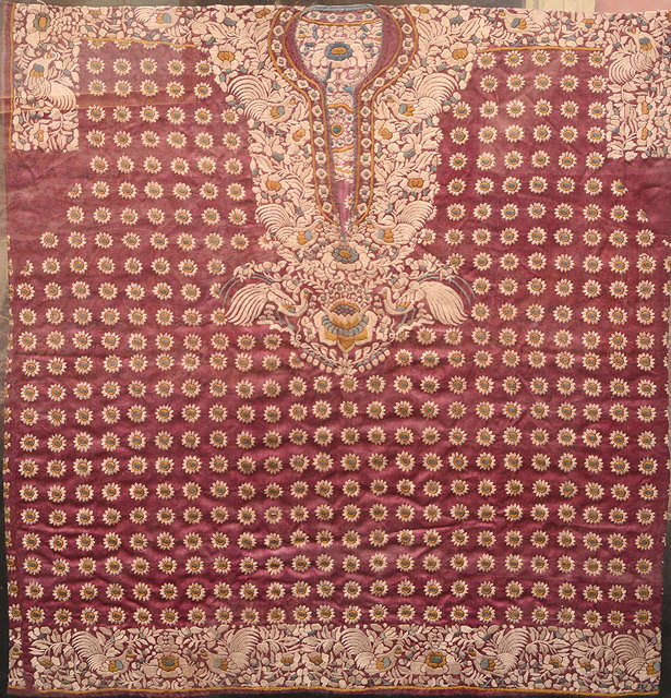 Appraisal: AN INDIAN DRESS FRAGMENT of pink ground material decorated with