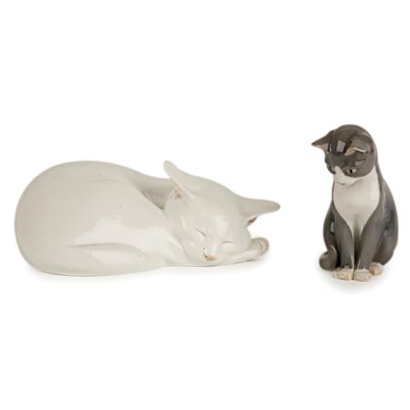 Appraisal: Royal Copenhagen Porcelain Figure of a Recumbent Cat Together with