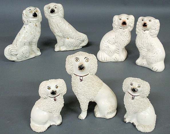 Appraisal: Seven th c Staffordshire poodles and Spaniels