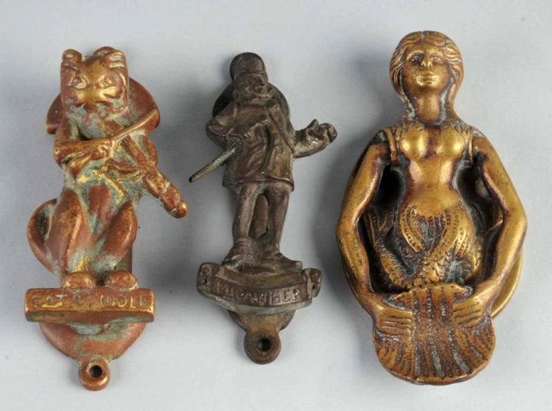 Appraisal: Lot of Cast Brass Figural Doorknockers Description English Condition Excellent