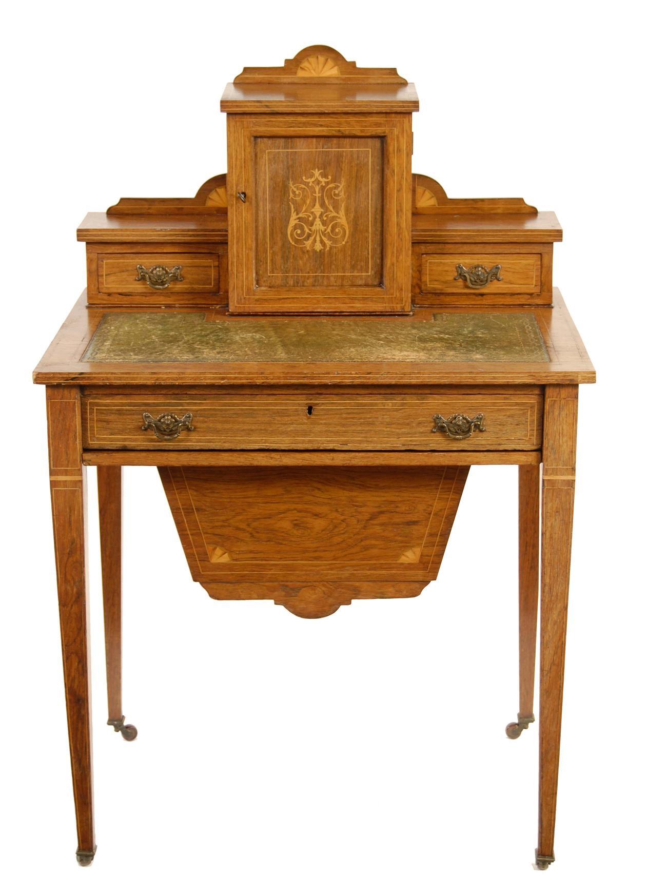 Appraisal: A late Victorian rosewood and marquetry desk