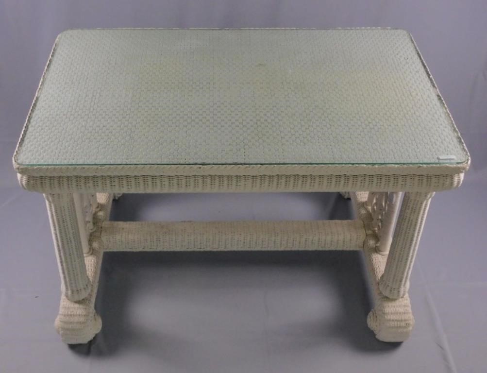 Appraisal: top rolled sides empire style base with decorative curlicue panels