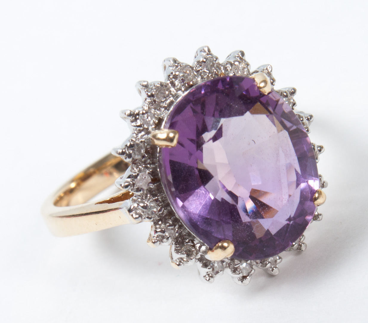 Appraisal: Lady's K gold and amethyst ring surrounded by diamond chip