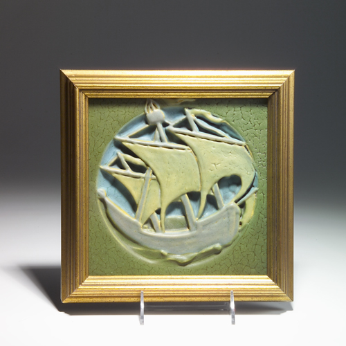 Appraisal: ROOKWOOD FAIENCE tile modeled with a tall ship in green