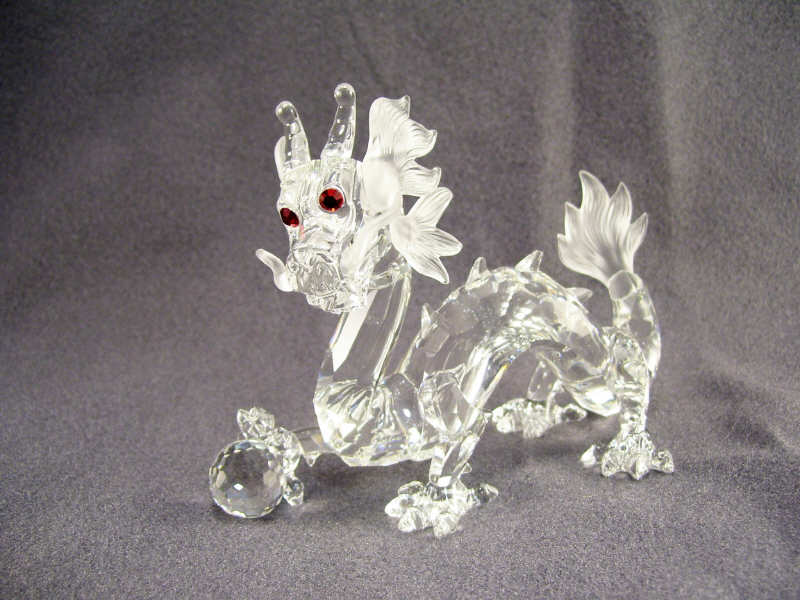 Appraisal: Swarovski Crystal Dragon Crystal dragon figure with red crystal eyes