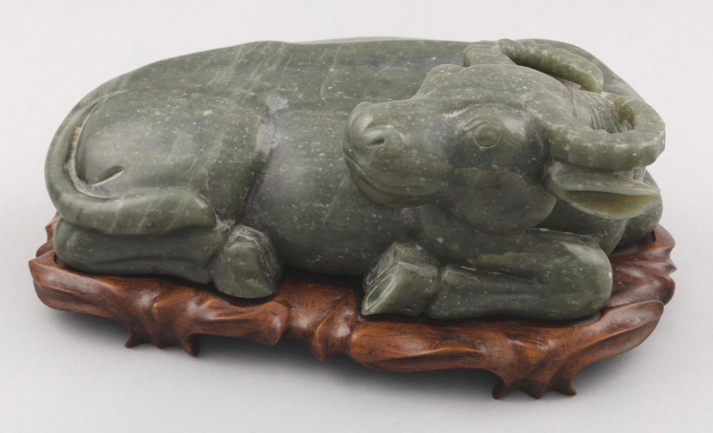 Appraisal: CHINESE GREEN JADE CARVING OF A RECLINING WATER BUFFALO TH