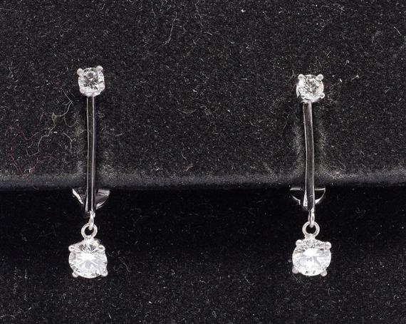 Appraisal: DIAMOND EAR CLIPS White gold Plain ear clips in the