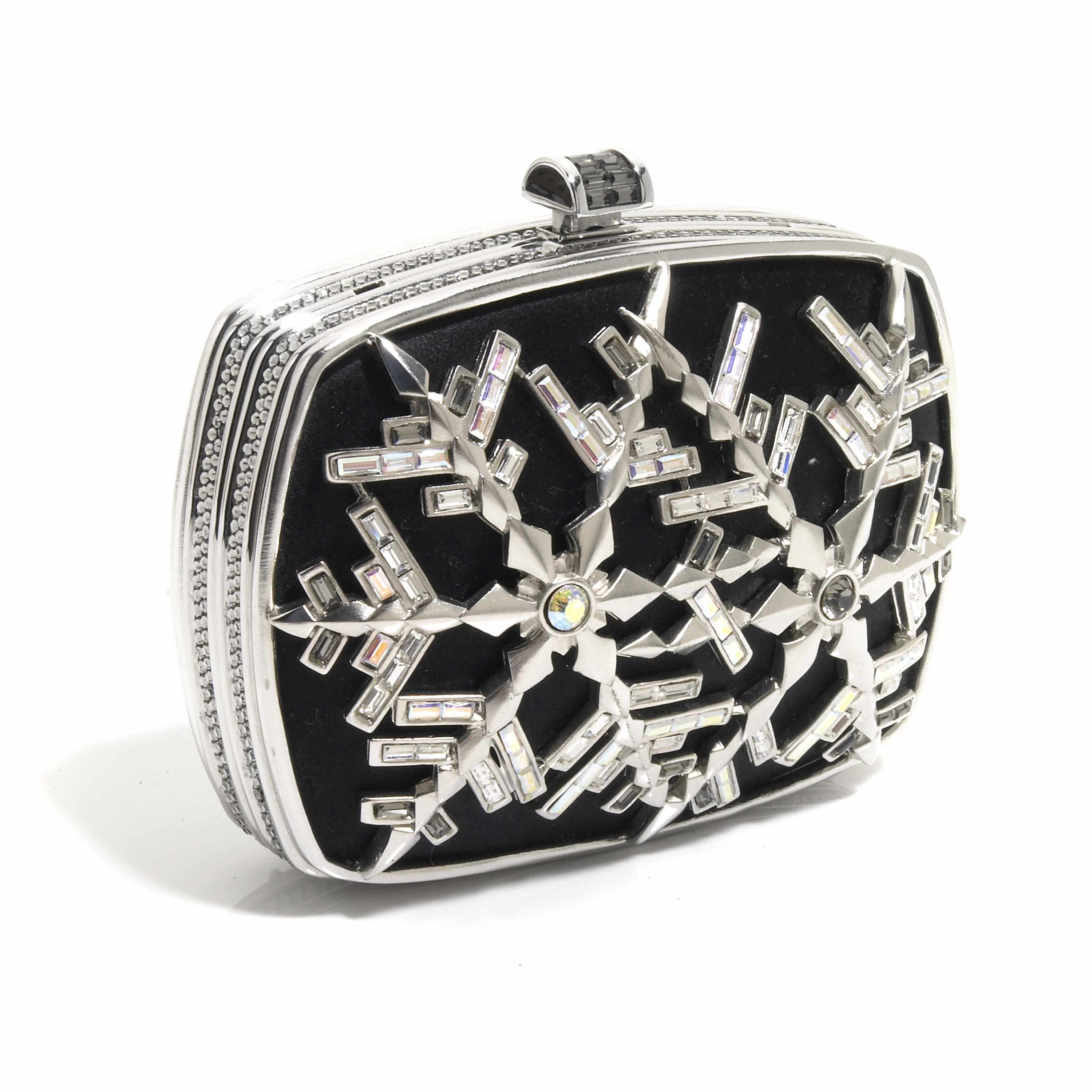 Appraisal: A black satin and silver rhinestone snowflake motif purse signed