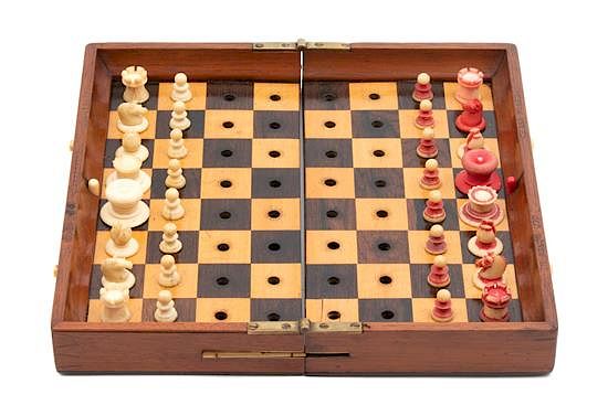 Appraisal: A French Chess Set in Leather Travel Case A French