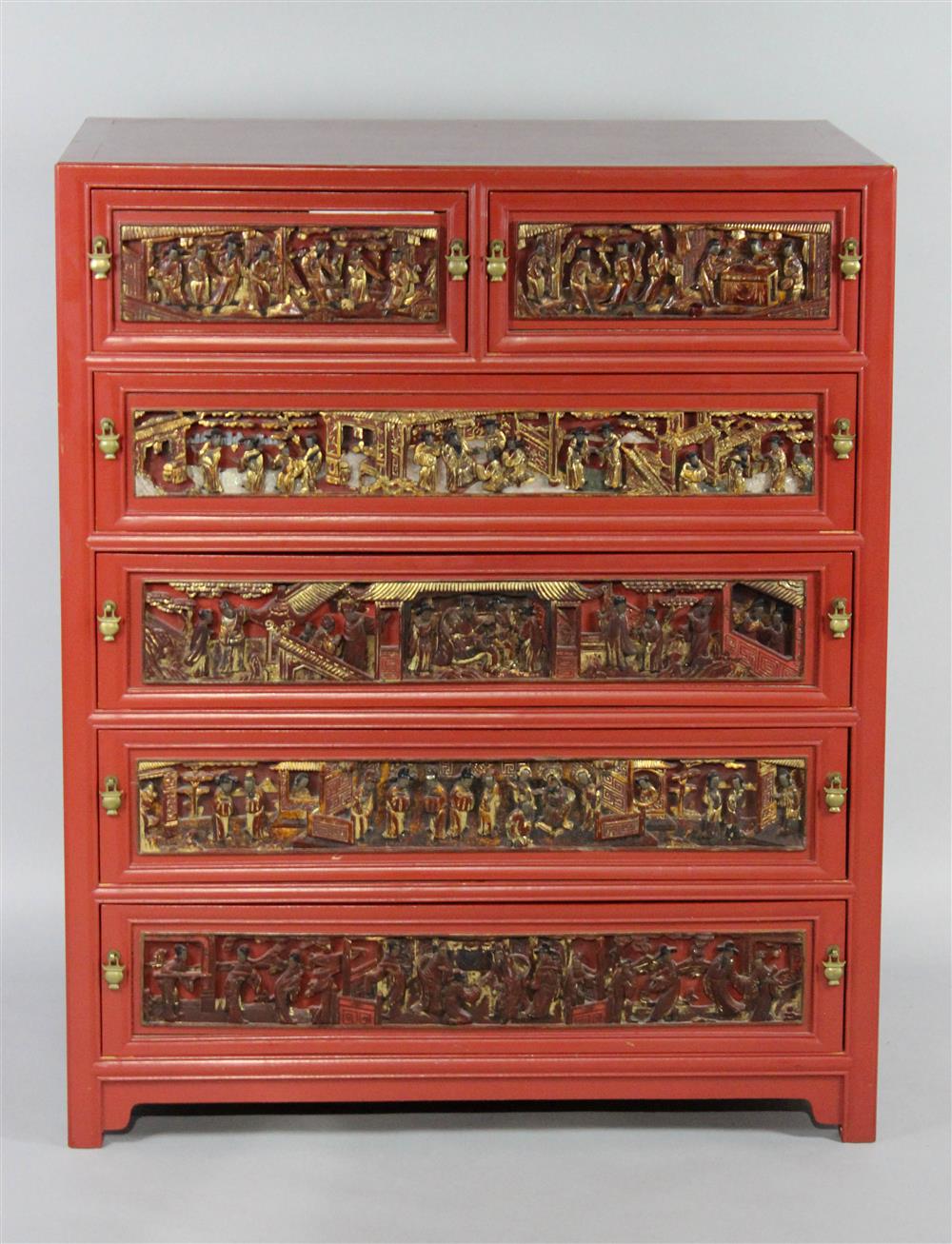 Appraisal: CHINESE CARVED TALL WOOD CHEST the narrow rectangular red-painted case