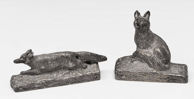 Appraisal: Two silver menu holdersin the form of two foxes retailed