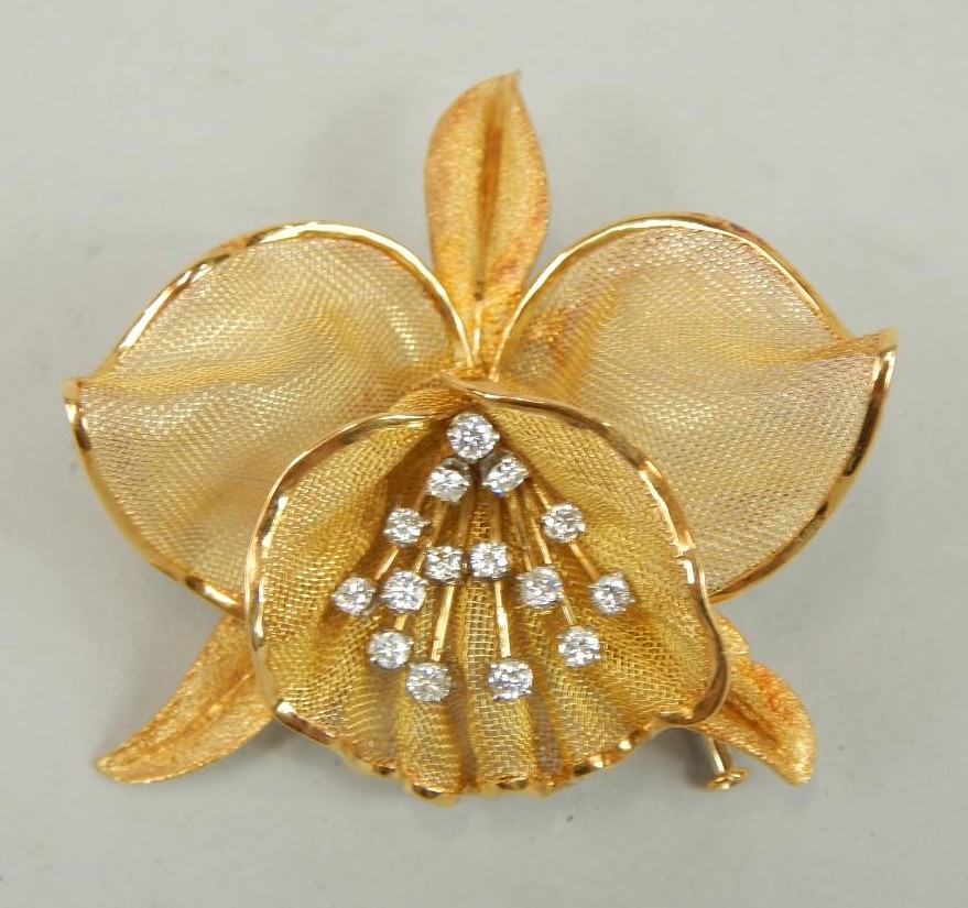 Appraisal: A diamond set brooch c 's with mesh design iris