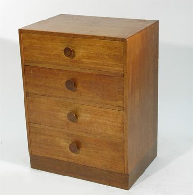 Appraisal: A Heal's oak three drawer chest of drawers applied ivorine