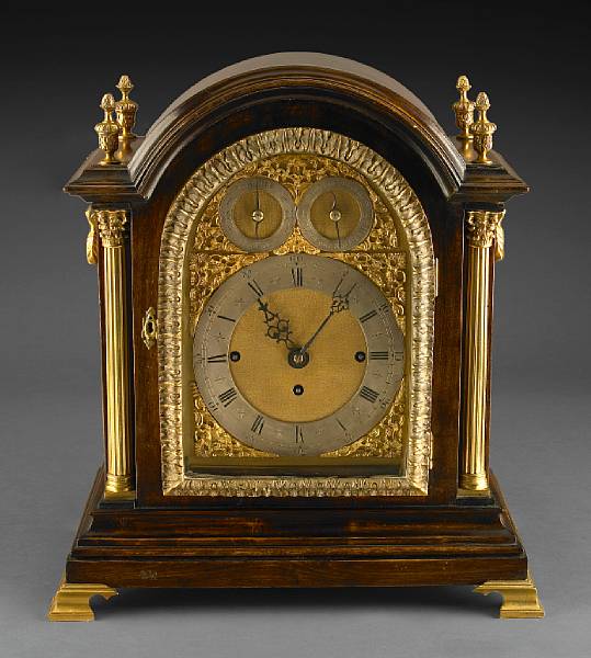 Appraisal: A Victorian gilt brass mounted mahogany quarter chiming bracket clock