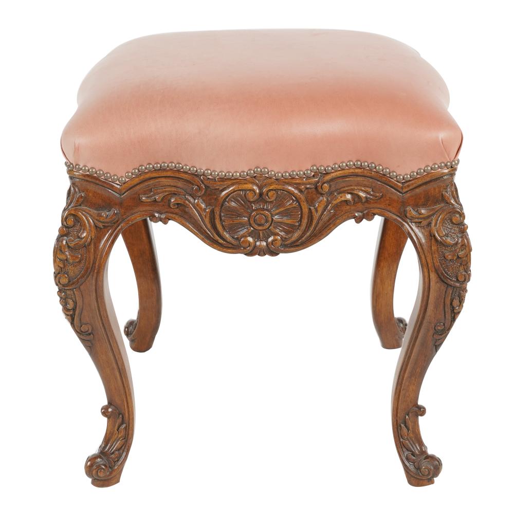 Appraisal: FRENCH PROVINCIAL-STYLE CARVED WALNUT STOOLwith leather or vinyl-covered seat Provenance