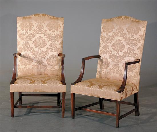 Appraisal: Pair Federal style inlaid mahogany lolling chairs mid th centuryserpentine