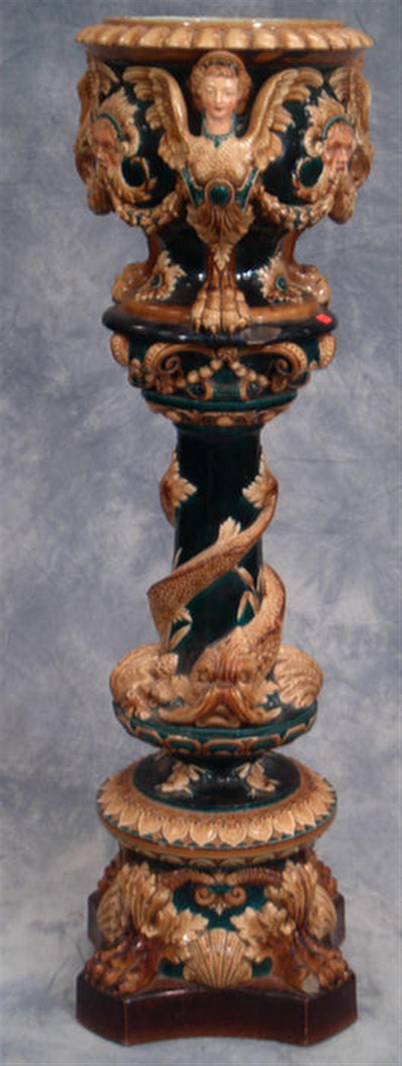 Appraisal: Majolica jardini re and pedestal dolphin wrapped arms paw foot