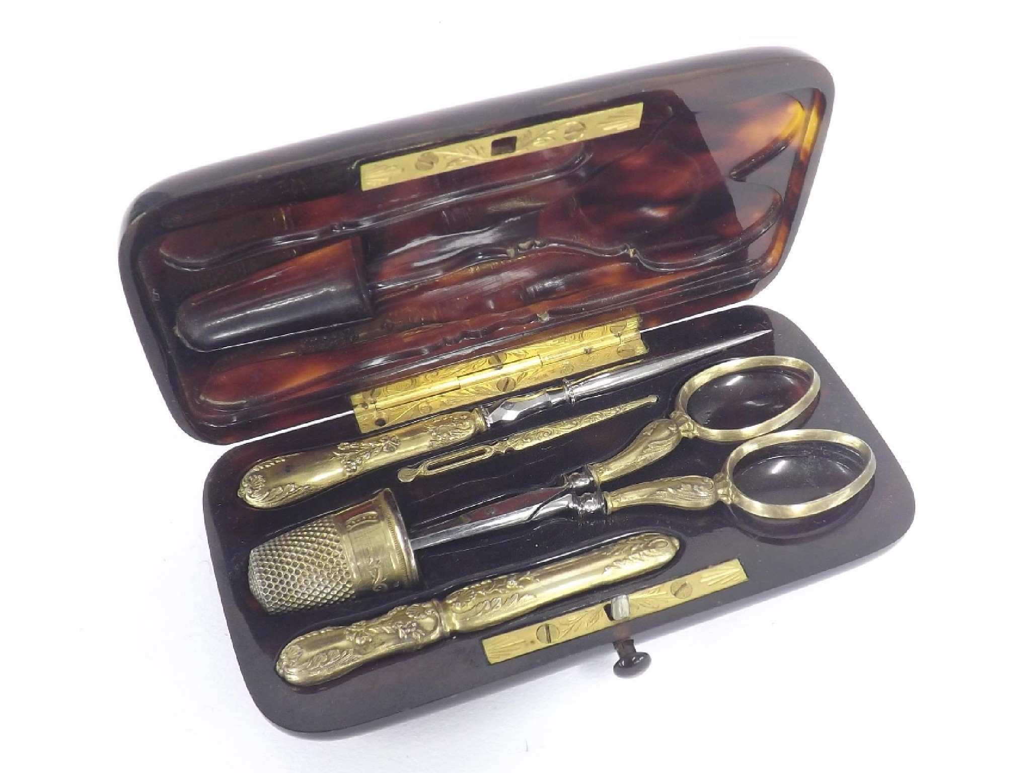 Appraisal: Good quality tortoiseshell etui fitted with five silver-gilt sewing tools