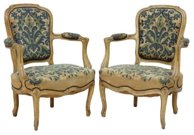 Appraisal: pair French Louis XV style parcel gilt and painted armchairs