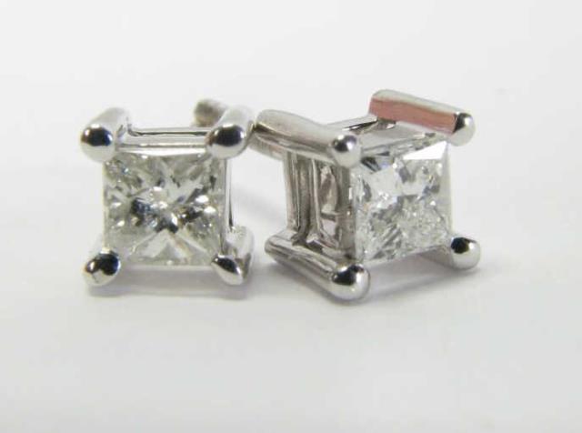 Appraisal: A pair of K yellow gold mounted ctw princess cut