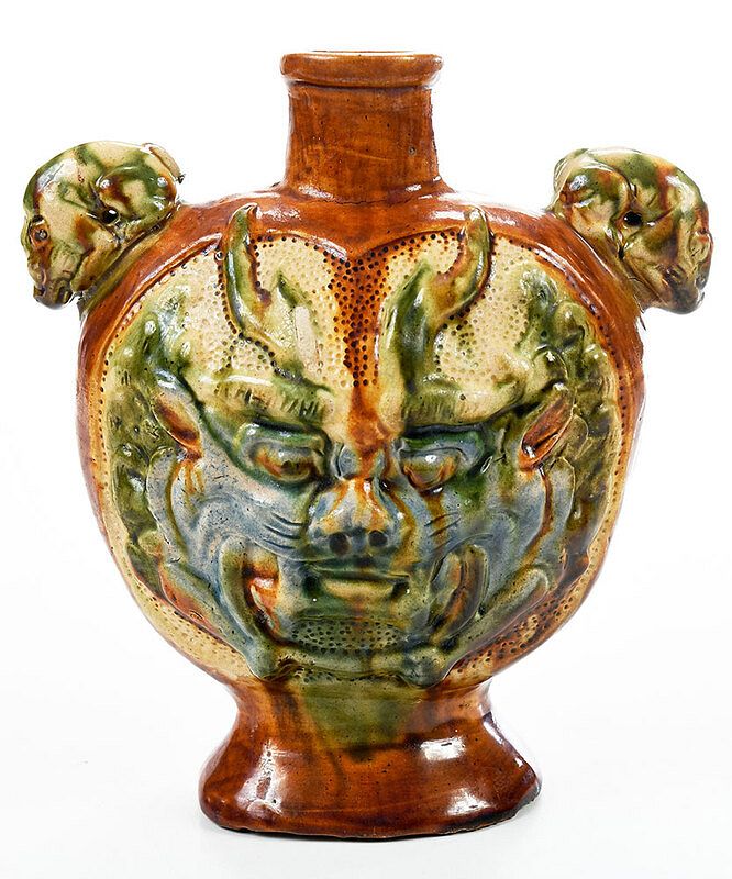 Appraisal: Chinese Sancai Glazed and Molded Pilgrim Flask Tang or Tang