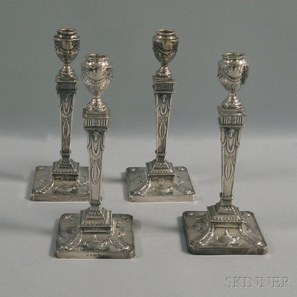 Appraisal: Set of Four English Weighted Silver-clad Candlesticks Birmingham maker's mark