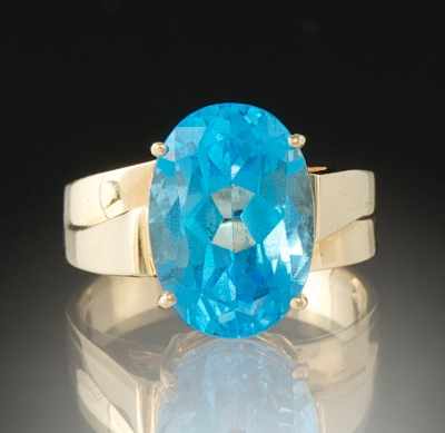 Appraisal: A Ladies' Blue Topaz Ring k yellow gold ring set