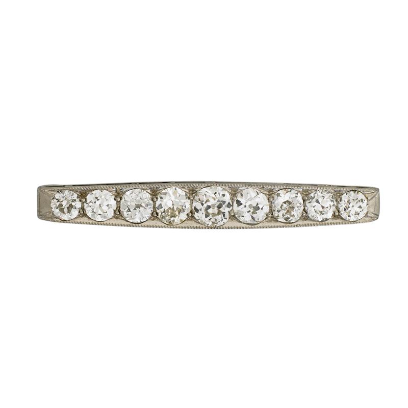 Appraisal: ART DECO NINE-STONE DIAMOND PLATINUM BROOCH Condition Report