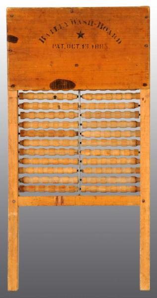 Appraisal: Wooden Washboard Description Dated Two-sided spool-type board Condition Very Good