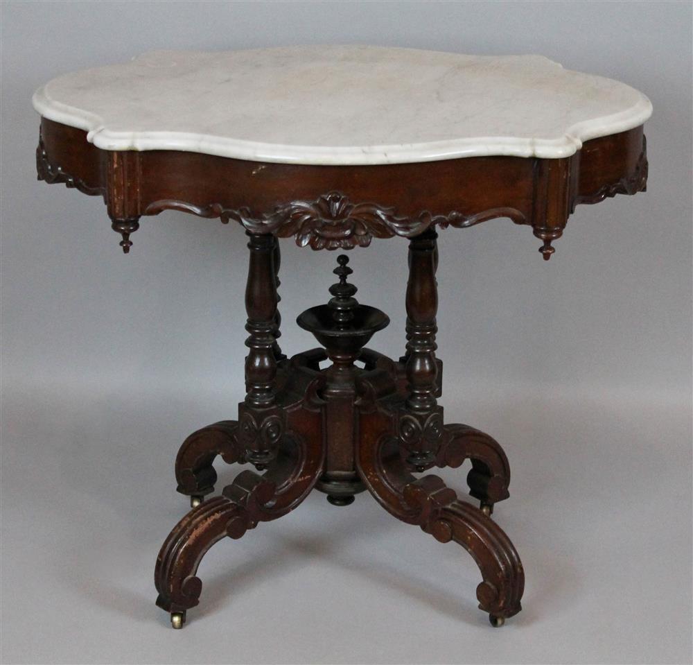 Appraisal: VICTORIAN MARBLE TOPPED MAHOGANY TABLE the Carrera marble serpentine top