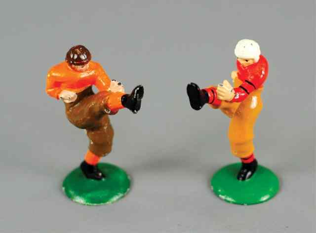 Appraisal: LOT OF TWO FOOTBALL PLAYER PAPERWEIGHTS Hubley cast iron once