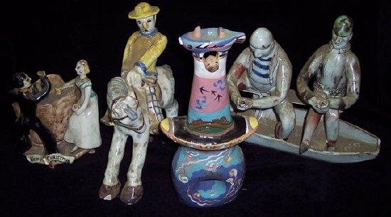 Appraisal: A studio pottery figure group two fishermen in a boat