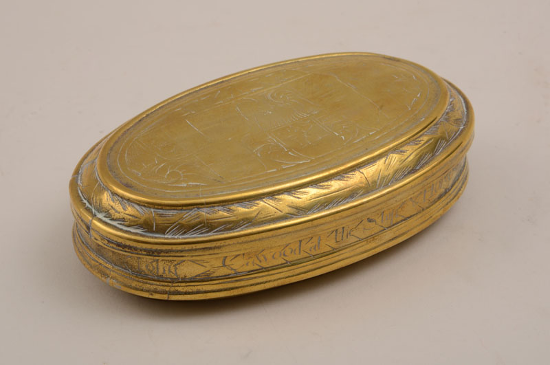 Appraisal: Dutch Engraved Brass Tobacco Box With crest and amusing profile