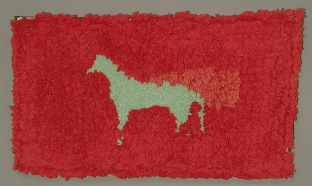 Appraisal: Hooked rug with horse laid down on wood x