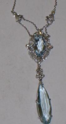 Appraisal: AN AQUAMARINE AND DIAMOND NECKLACE comprising elongated pearl form aqua