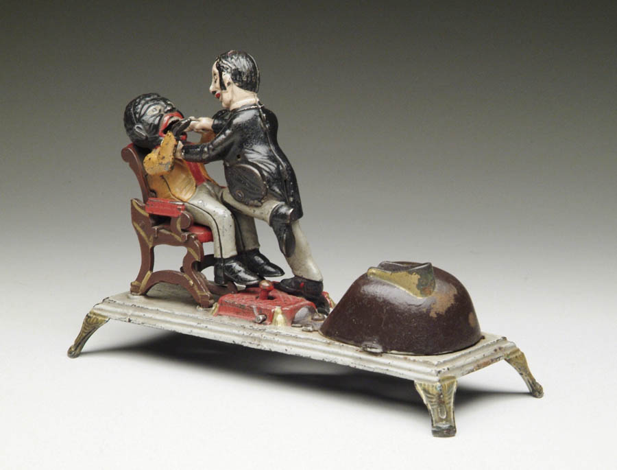 Appraisal: FINE DENTIST MECHANICAL BANK BY STEVENS Just consigned from the