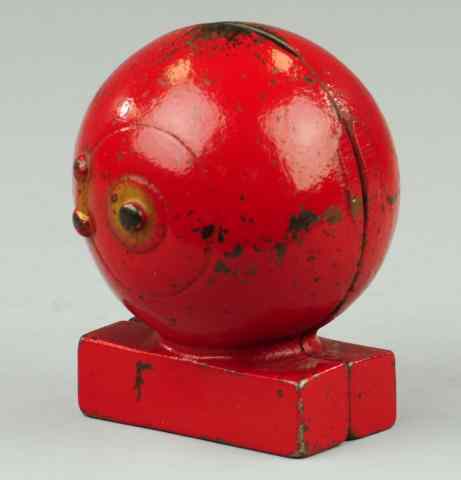 Appraisal: RED BALL SAFE STILL BANK Cast iron painted in red