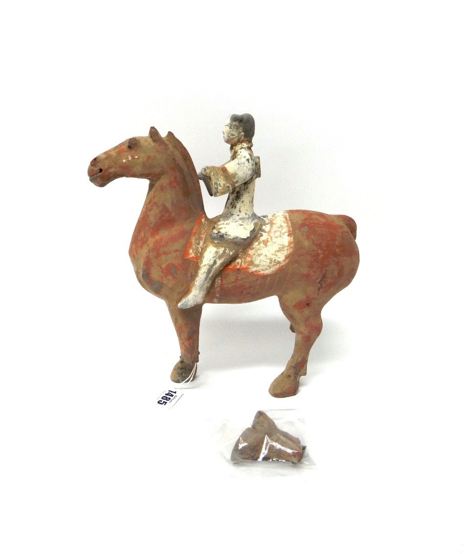 Appraisal: A Han style grey pottery equestrian figure picked out in