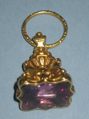 Appraisal: A GEORGIAN AMETHYST SEAL the shaped oblong stone on foliate