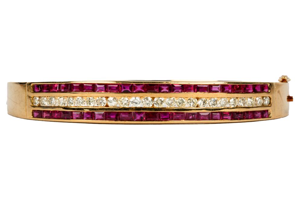 Appraisal: KARAT YELLOW GOLD DIAMOND RUBY BANGLE BRACELETcontaining rectangular step cut